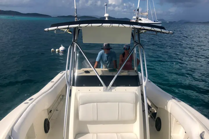 a small boat in a body of water