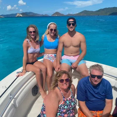 a man and woman swimming in the water