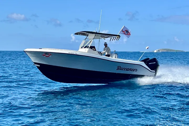 a small boat in a large body of water