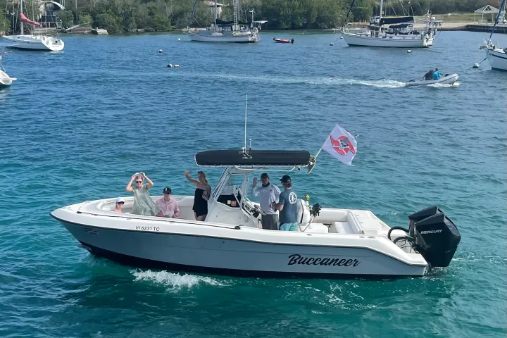 a small boat in a large body of water