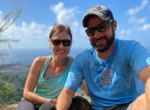 a person petting a dog