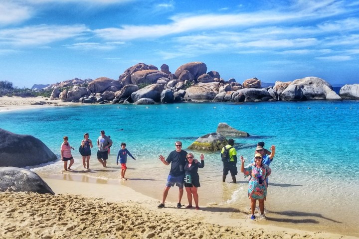 a group of people on a beach