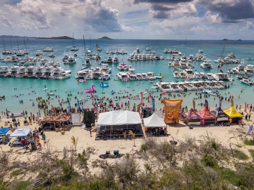 a group of people on a beach