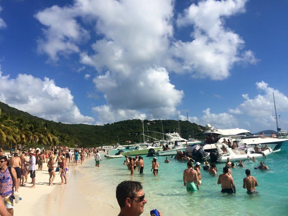 a group of people on a beach