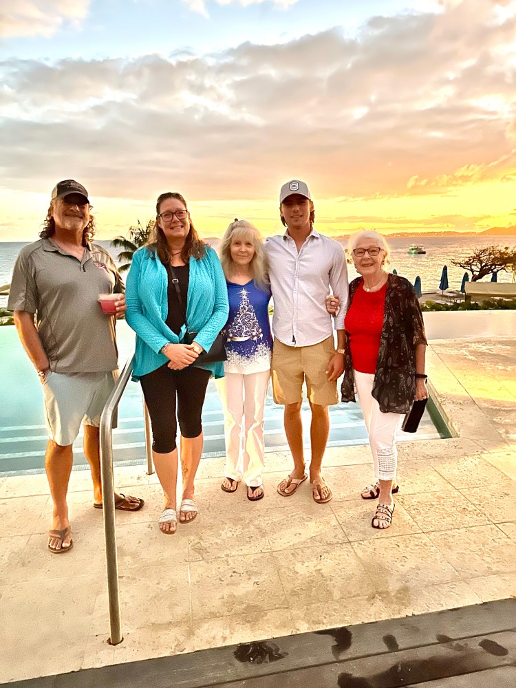 a group of people posing for a photo