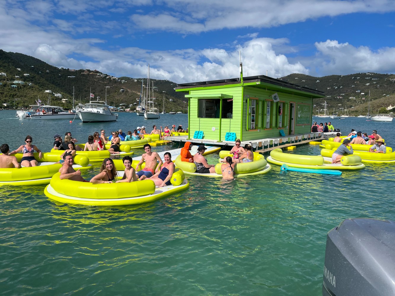 a group of people on a boat in the water