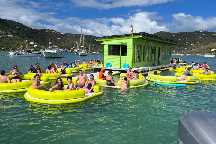 a group of people on a boat in the water