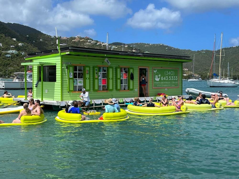 a group of people on a boat in the water