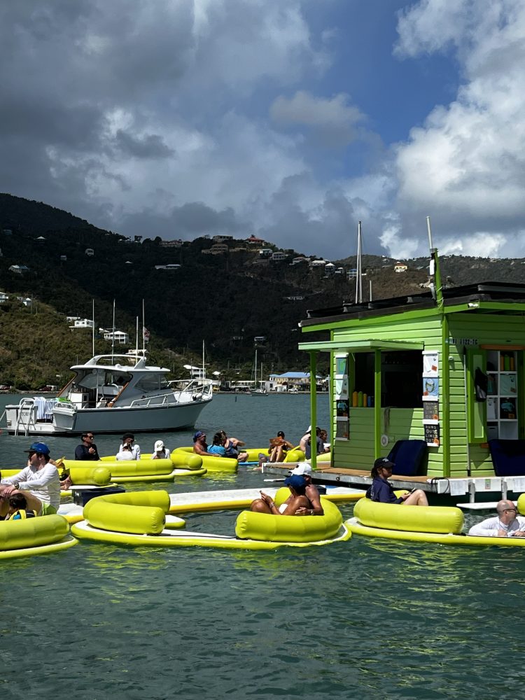 a group of people on a boat in the water