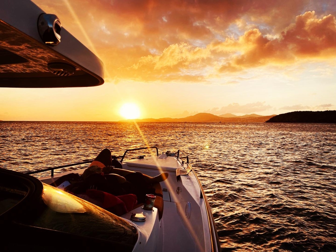 a boat sitting on top of a beach