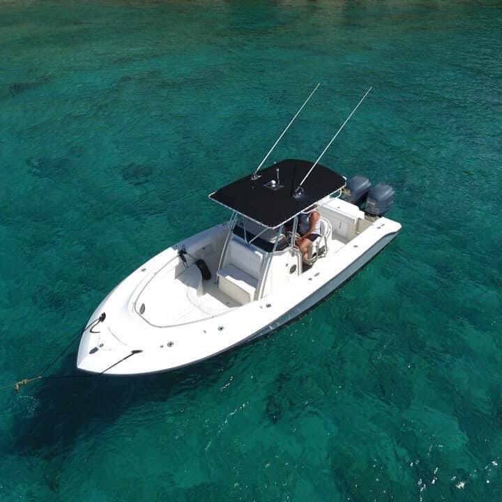 a small boat in a body of water